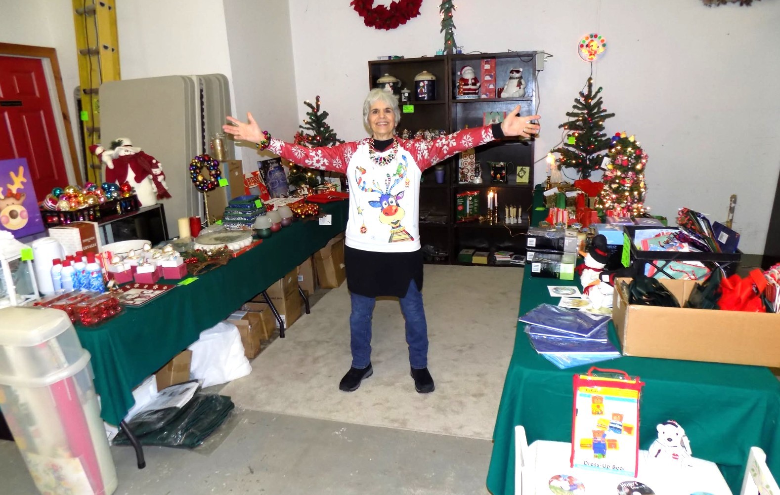 Small independent vendor booth at a flea market with handmade crafts